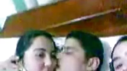 A man kisses two girls are Arab (Egypt) in bed